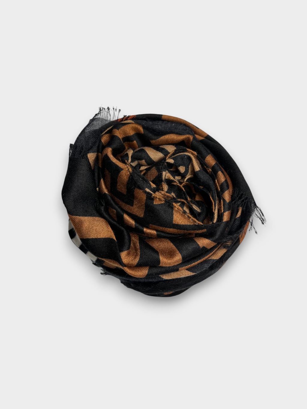C pattern on printed scarf